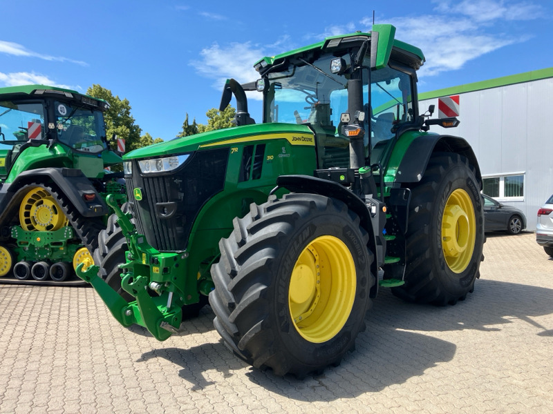 John Deere 7R310 mit PowerGard bis 02/27 - Farm tractor: picture 1 John Deere 7R310 mit PowerGard bis 02/27 - Farm tractor: picture 1