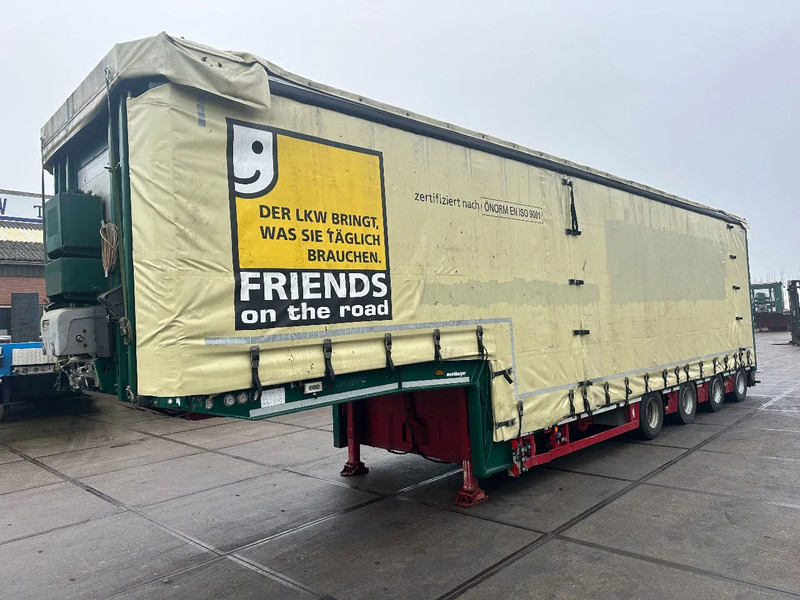 MEUSBURGER 4 axel steering, Double extendable up to 28 meters, extendable up to 3.2 meters, radio controlled, sliding roof - Low loader semi-trailer: picture 1 MEUSBURGER 4 axel steering, Double extendable up to 28 meters, extendable up to 3.2 meters, radio controlled, sliding roof - Low loader semi-trailer: picture 1