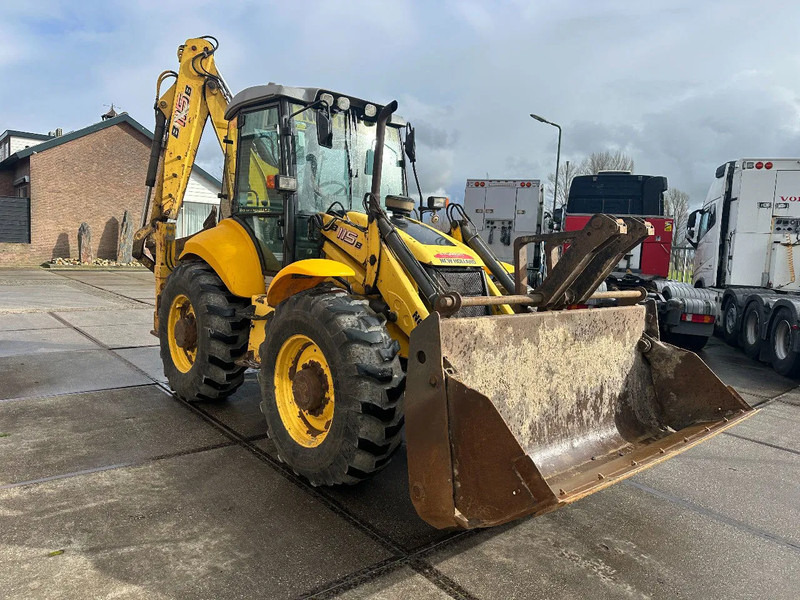 New Holland LB115B, CE, 240 MM MULTI PURPOSE LOADER BUCKET, 800 MM BACHOE DIGGING BUCKET, FLIP OVER FORKS, AIR CONDITIONER - Backhoe loader: picture 5 New Holland LB115B, CE, 240 MM MULTI PURPOSE LOADER BUCKET, 800 MM BACHOE DIGGING BUCKET, FLIP OVER FORKS, AIR CONDITIONER - Backhoe loader: picture 5