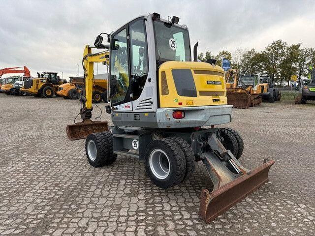 Neuson EW65, Verstellausleger, Hydr. S.W.S.,Div. Löffel - Wheel excavator: picture 3 Neuson EW65, Verstellausleger, Hydr. S.W.S.,Div. Löffel - Wheel excavator: picture 3