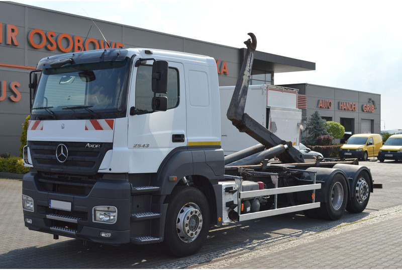 Mercedes-Benz AXOR 2543 HOOK JANCO HS20 14T KLIMA WEBASTO Bed Steering Axle Au - Hook lift truck: picture 1 Mercedes-Benz AXOR 2543 HOOK JANCO HS20 14T KLIMA WEBASTO Bed Steering Axle Au - Hook lift truck: picture 1