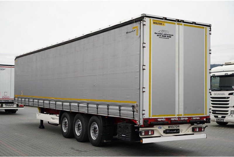 Wielton FIRANKA STANDARD / MULDA DO STALI - 9 M / OŚ PODNOSZONA / SAF / - Curtainsider semi-trailer: picture 4 Wielton FIRANKA STANDARD / MULDA DO STALI - 9 M / OŚ PODNOSZONA / SAF / - Curtainsider semi-trailer: picture 4