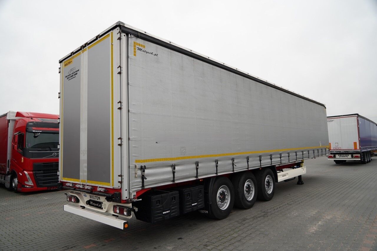 Wielton FIRANKA STANDARD / MULDA DO STALI - 9 M / OŚ PODNOSZONA / SAF / - Curtainsider semi-trailer: picture 5 Wielton FIRANKA STANDARD / MULDA DO STALI - 9 M / OŚ PODNOSZONA / SAF / - Curtainsider semi-trailer: picture 5