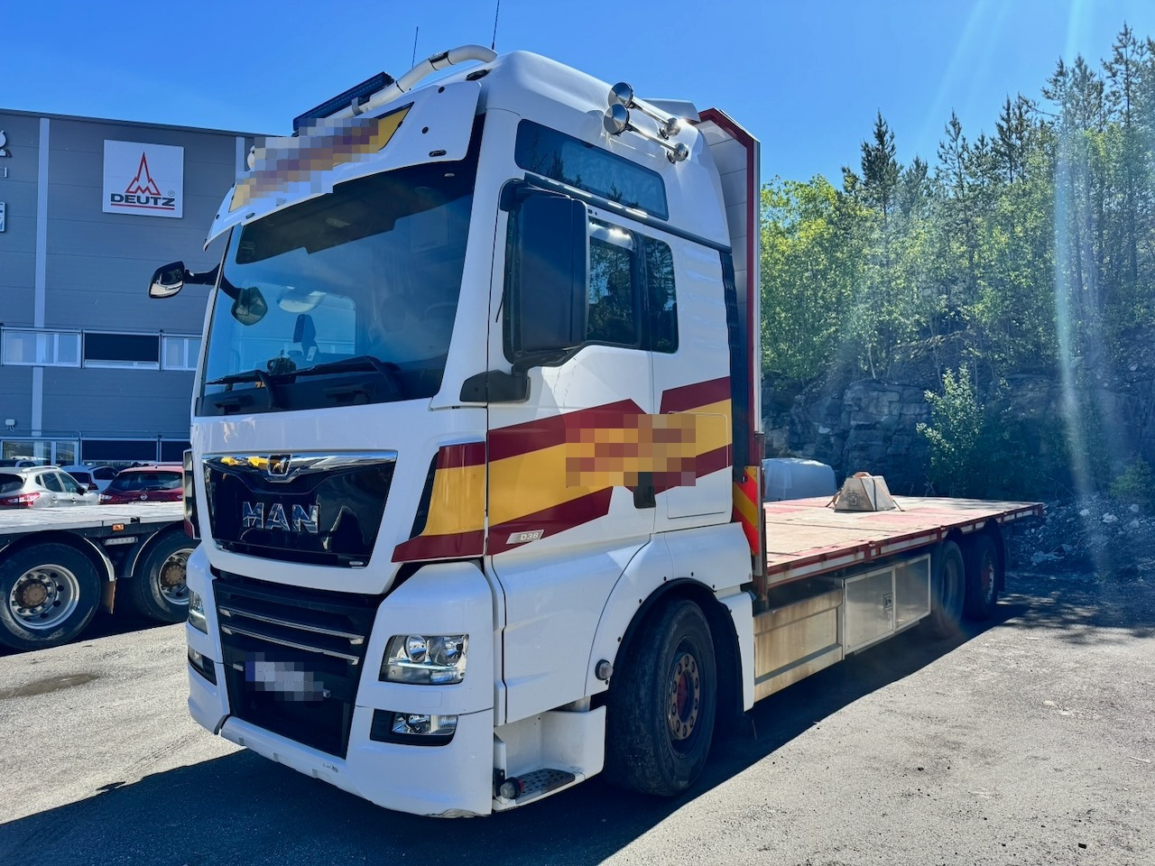 MAN TGX 580 - Dropside/ Flatbed truck: picture 1 MAN TGX 580 - Dropside/ Flatbed truck: picture 1