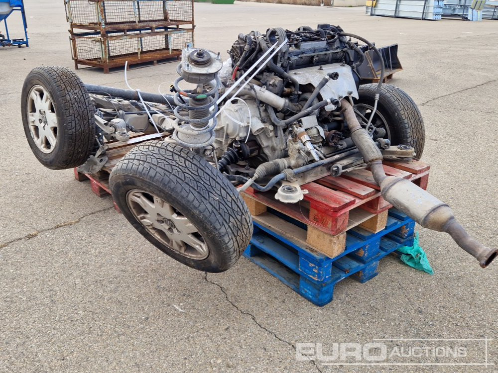Pallet of Volvo XC70 Spares including Axles, Tyres, Engine components - Construction equipment: picture 3 Pallet of Volvo XC70 Spares including Axles, Tyres, Engine components - Construction equipment: picture 3