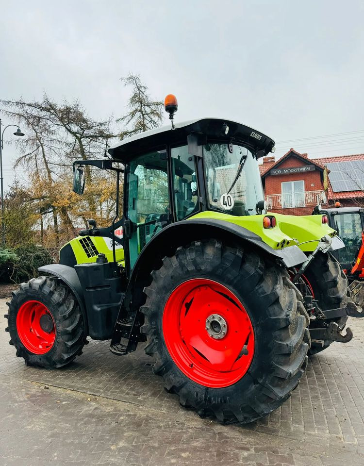 Farm tractor Claas Arion 620: picture 14