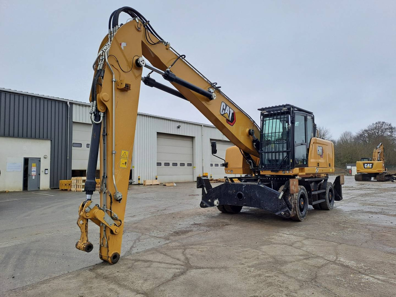 CAT MH3024 - Wheel excavator: picture 1 CAT MH3024 - Wheel excavator: picture 1