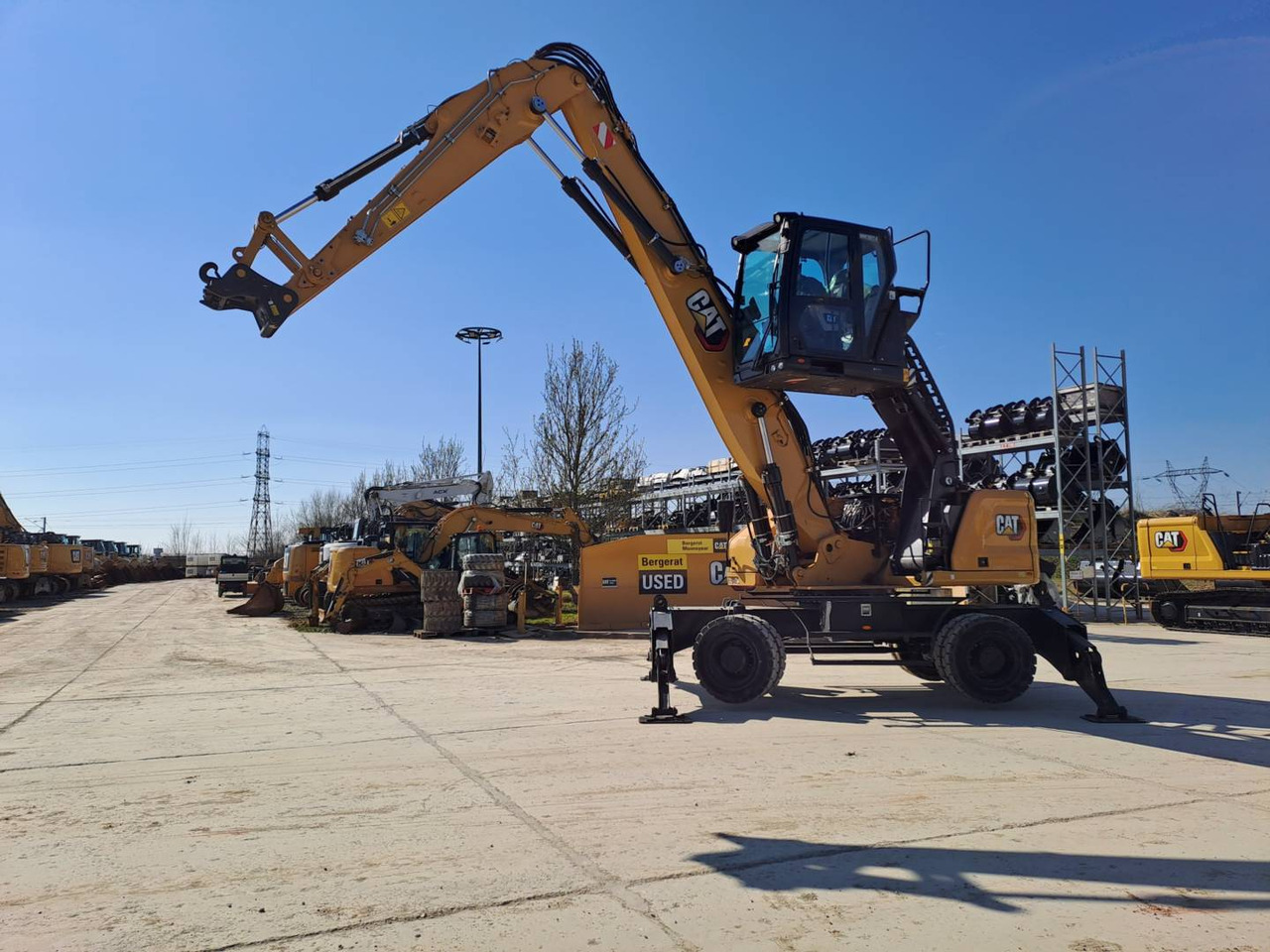 CAT MH3024 - Wheel excavator: picture 1 CAT MH3024 - Wheel excavator: picture 1